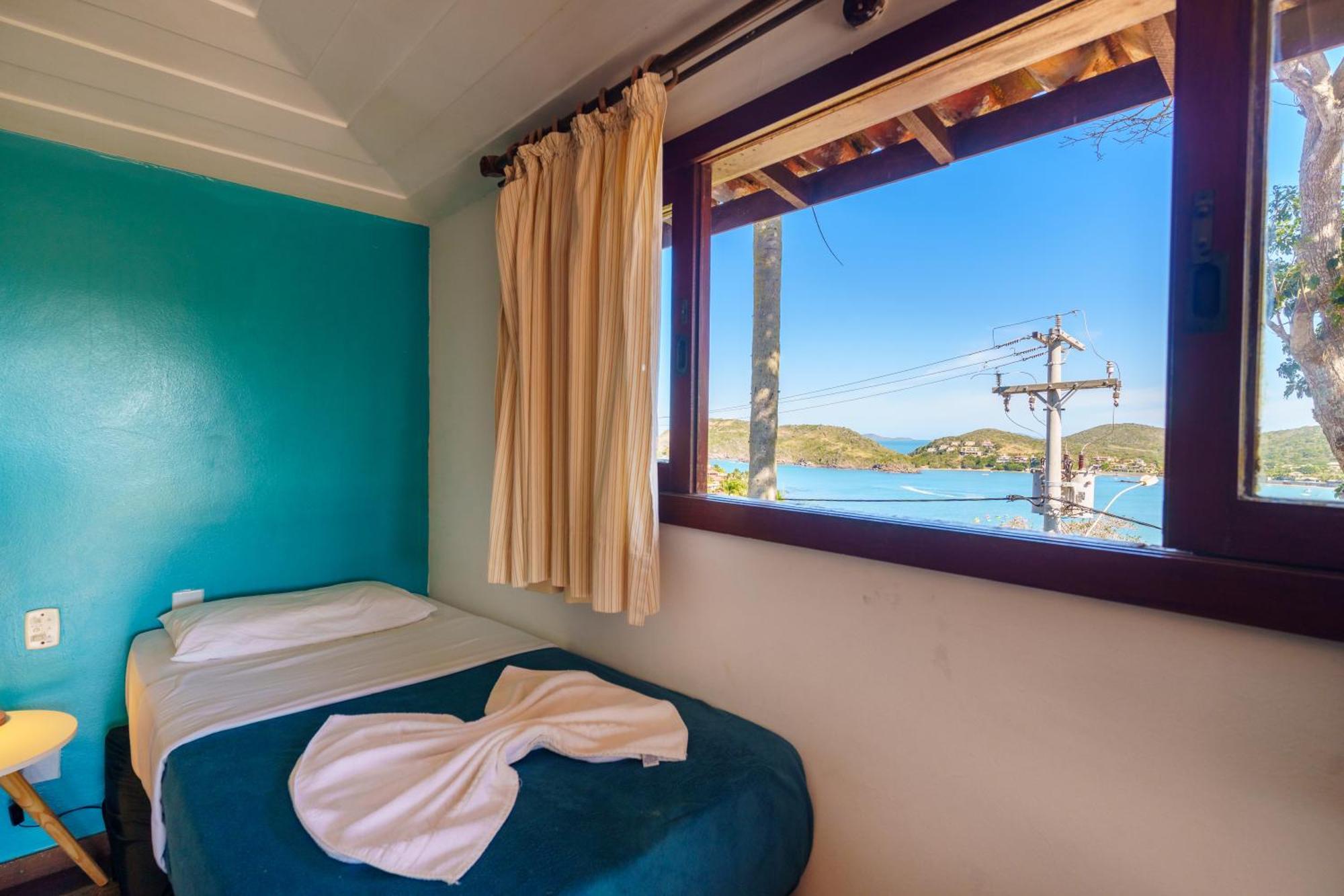 Quarto Quádruplo com Vista do Mar.
